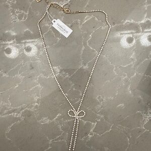 Brand new Park Lane sparkle bow necklace gold